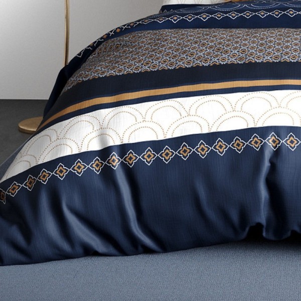 Détails des motifs de la housse de couette Kalypso 260x240 cm motif géométrique bleu marine et ocre
