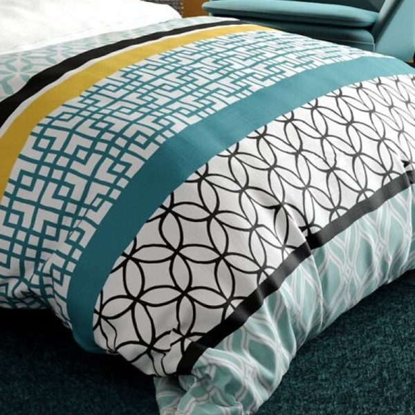 Housse de couette Citedor format 260x240 motifs cercles noirs et losanges turquoises pour grand lit double.